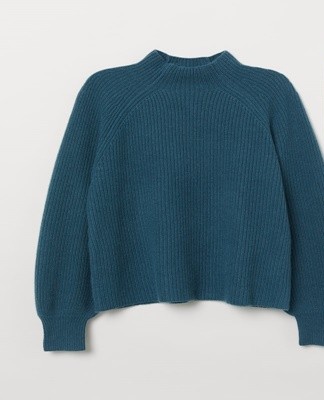 Once the cashmere sweater has been washed, it is turned inside out and hung out to dry.