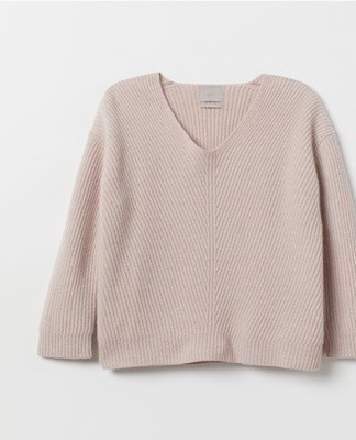 If the sweater is stretched, it is best to machine wash it.