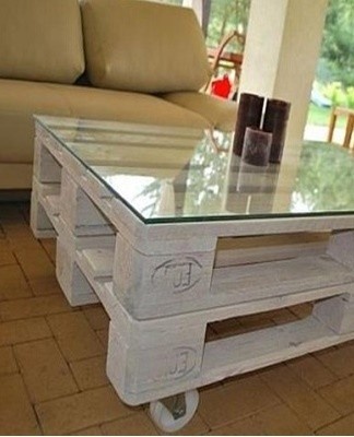 A table of 2 pallets and legs of any material: bars, bricks, blocks.