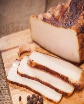  Lard in a few hours or even a day is cut into portions and rubbed with salt.