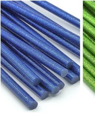 A colorless, hard glue that closely resembles lipstick in appearance.