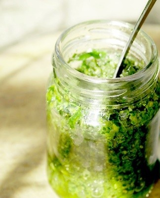 Grated vegetables are placed in sterilized containers and poured with cooked marinade.