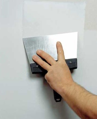 Mix the putty with water and fill in any uneven areas with it.