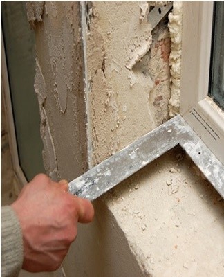 Installation along the outer contour of the window opening of a metal profile (outer guides) using a level.