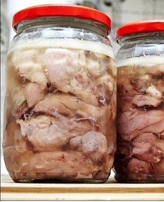 Homemade stew is prepared with the addition of pork, beef and lamb fat