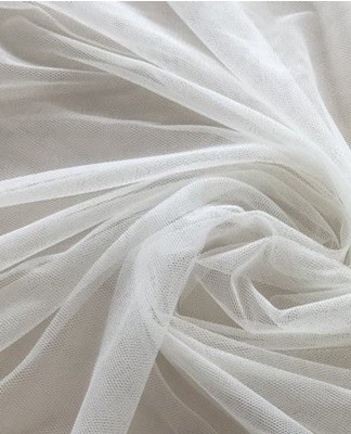 Sheer mesh fabric is made of silk or synthetic fibers.