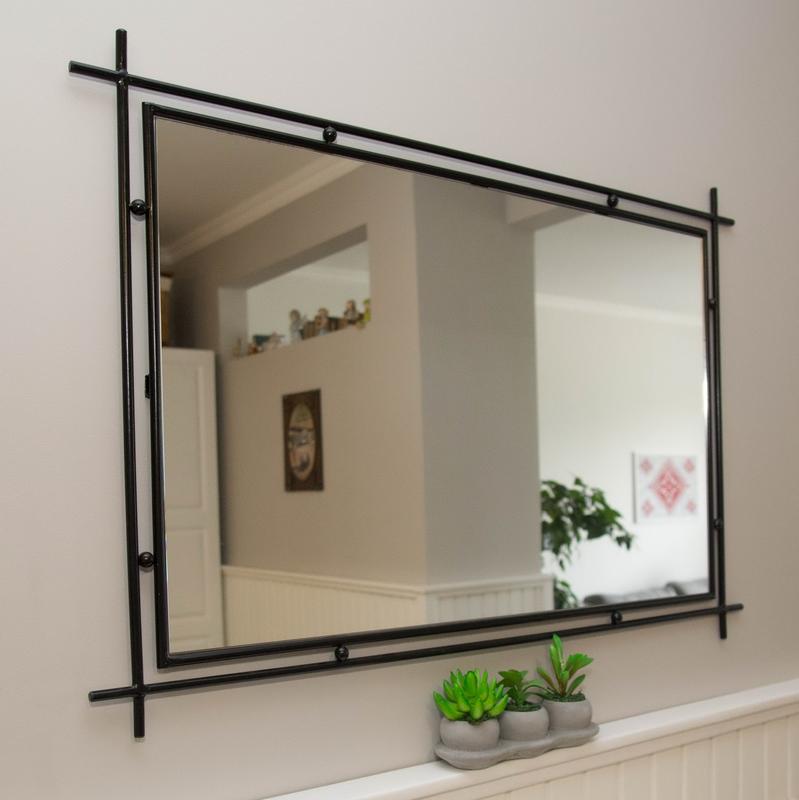 Massive framed mirror