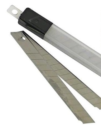 For some, it is more convenient to work with a clerical knife than with scissors.