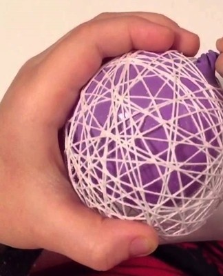 A pre-inflated rubber ball (it is better to take a round one, then the product turns out to have the right shape) is attached so that air does not escape from it.