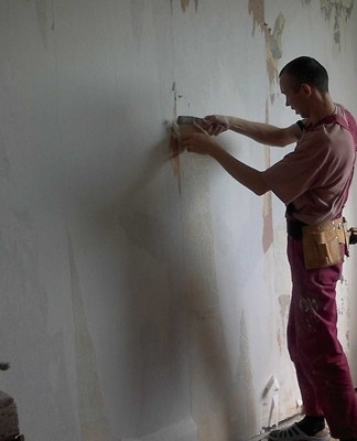 Paint or wallpaper applied to them is removed from all walls.