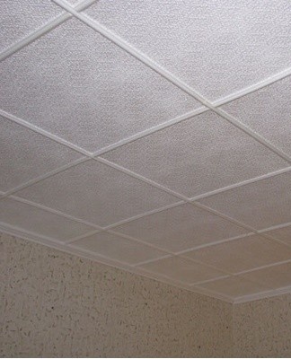 How to quickly and beautifully glue ceiling tiles with your own hands