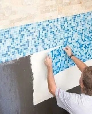 A two-component adhesive is used to fix the mosaic to a smooth surface.