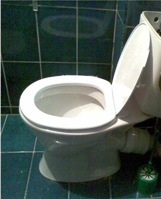 The liquid stagnates in the toilet due to the incorrect location of the pipes connected to the structure.