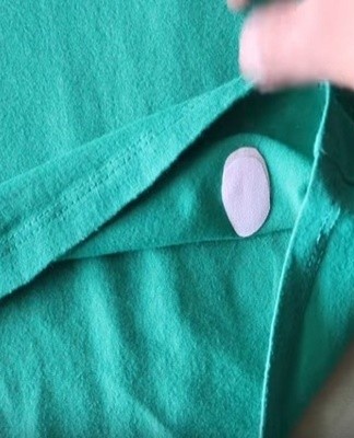 To keep anything from moving to the side, put a piece of white cloth over it and sprinkle with a spray bottle.