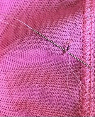 If there is a longitudinal tear on the T-shirt, you can repair it