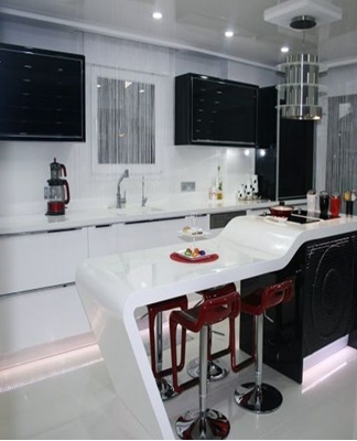 The high-tech kitchen contains modern materials: metal, glass, plastic.