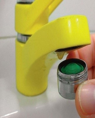 The aerator is a sleeve with a set of threads through which water passes.