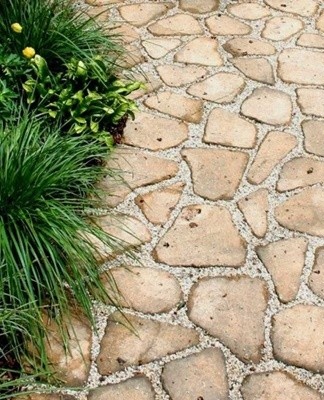 Clean the stone slab of debris and dirt with a stiff wire brush, then rinse thoroughly with a hose.