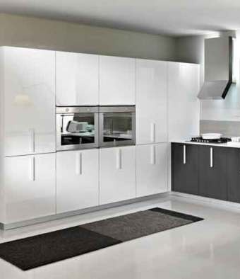 The high-tech kitchen contains modern materials: metal, glass, plastic.