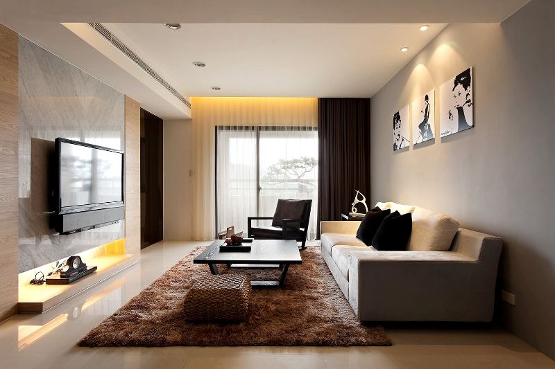 Despite the fact that brown can be a dark color, it is also often used in the design of loft-style living rooms.