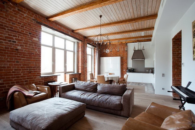 Despite the fact that brown can be a dark color, it is also often used in the design of loft-style living rooms.