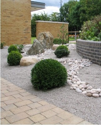 The stone composition is oriented around a point of contemplation.