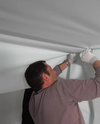 If there is excess material left after installing the stretch ceiling, it is suitable to hide the defect.
