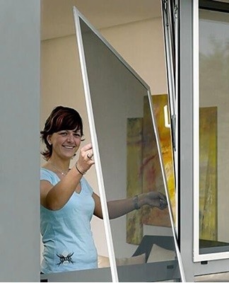 A mosquito net protects the apartment from small insects during the summer months.