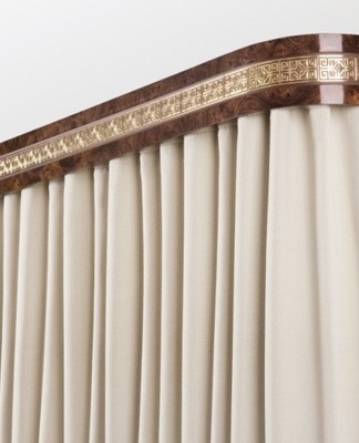 The cornice is closed at the front by a wide decorative band.