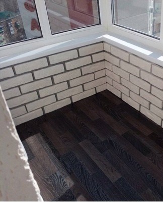 In many residential buildings, the walls of the balconies are made of brick.