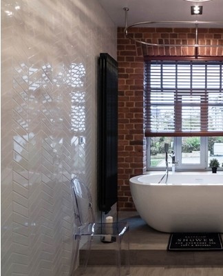 A bedroom in the loft style is distinguished by dark colors, rough texture, vagueness, negligence of decoration.