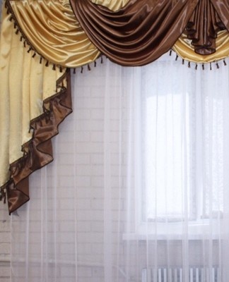 Lambrequins are often used in rooms with heavy curtains.