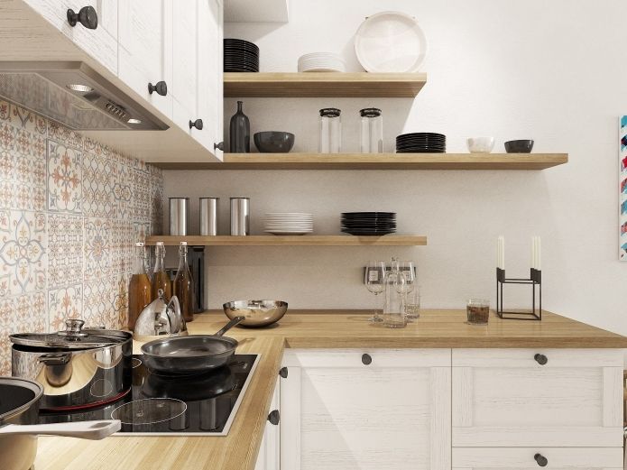 Appliances can be built into furniture or hidden behind the facade.