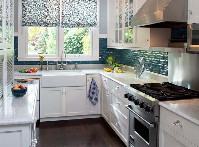The kitchen is decorated in calm, warm, neutral or cold colors.