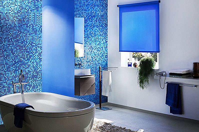 The bathroom color scheme in blue is one of the most successful.