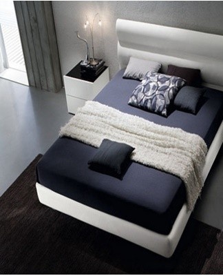 Curtains and textiles in the interior of the bedroom should not be eliminated from the color scheme.