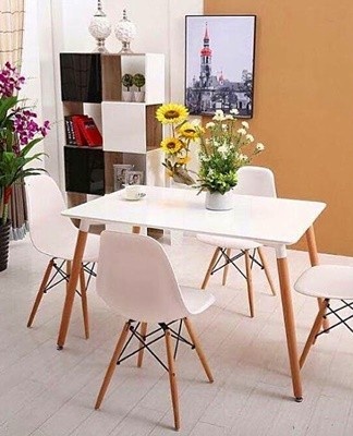 For compact rooms, it is recommended to purchase rectangular or square dining tables.