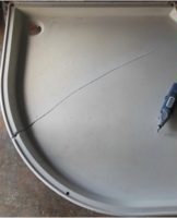 Better to seal the crack in the acrylic shower tray with your own hands