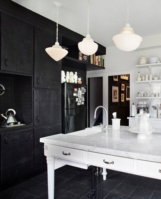 Matte black surfaces with patterned prints, black and white photo wallpapers absorb light.