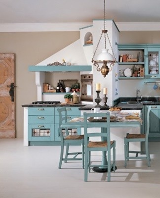 If the room is located on the sunny side and there is enough light, you can hang a chandelier above the table.