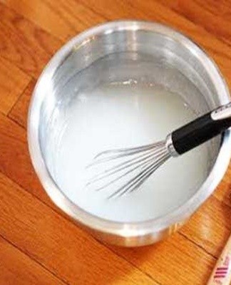 Carpenter's glue is added to the basic recipe for making papier-mâché adhesive from flour.