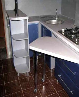 The nesting table is often used as a dining area or additional kitchen area.