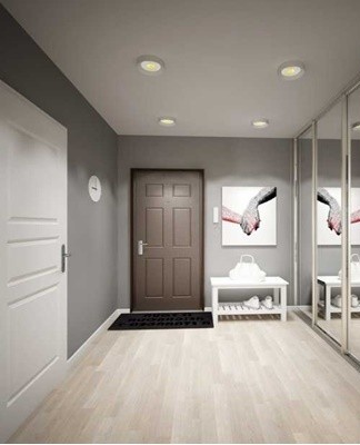 In spacious hallways, zonal lighting is recommended, in small ones - devices are placed around the perimeter on the ceiling.