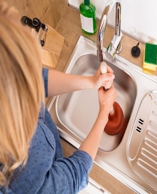 Water is pumped with a piston