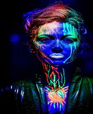 For body art, there is a special luminescent dye that is harmless to the body.
