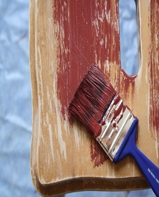 The base coat is applied over a thin layer of primer.