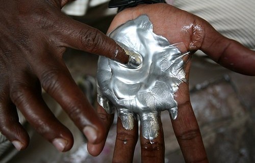 silver woman in her arms