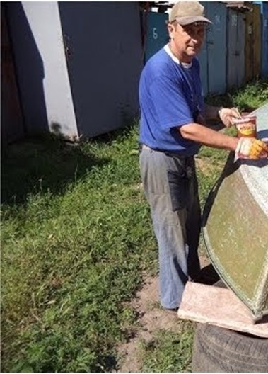 Painting the boat at home